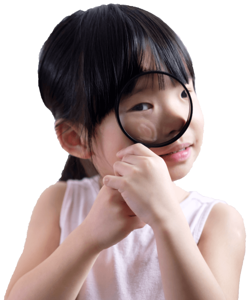 little girl child looking through a magnifying gla CK9QVN4